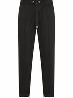 Dolce & Gabbana pantalon de jogging rayé à lien de resserrage - Noir