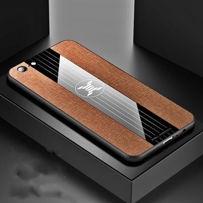 Voor OPPO A57 XINLI stiksels doek Textue schokbestendig TPU beschermhoes (bruin)