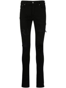 AMIRI jean skinny à logo imprimé - Noir