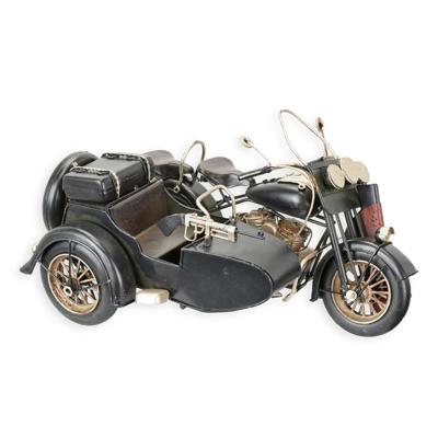 A TIN MODEL OF A MILITARY MOTORCYLE WITH SIDECAR