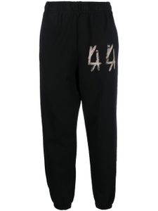 44 LABEL GROUP pantalon de jogging à logo imprimé - Noir