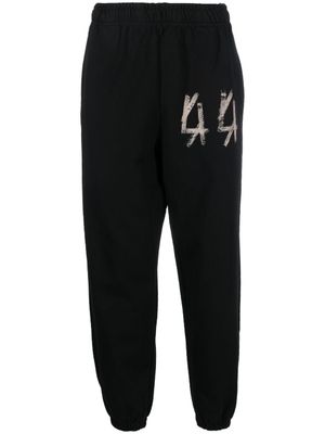 44 LABEL GROUP pantalon de jogging à logo imprimé - Noir