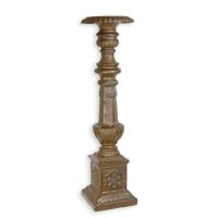 A CAST IRON CANDLE STAND - BROWN