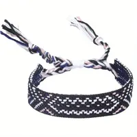 Handgemaakte geweven verstelbare armband uit Nepal met wit-zwart motief - Sieraden - Spiritueelboek.nl - thumbnail