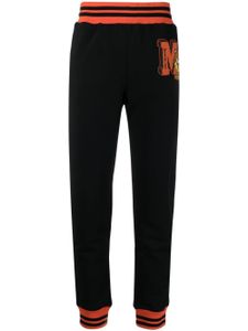 Moschino pantalon de jogging à patch logo - Noir