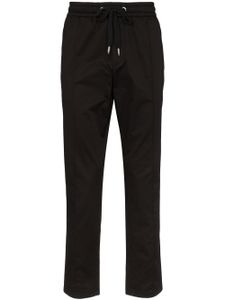 Dolce & Gabbana pantalon de jogging à plaque logo - Noir