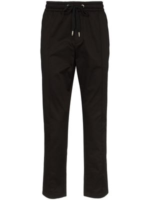 Dolce & Gabbana pantalon de jogging à plaque logo - Noir