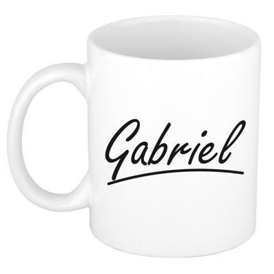 Gabriel Naam koffiemok - beker - met sierlijke letters - wit - 300 ml - Cadeau - Heren Gabriel Naam koffiemok - beker - met sierlijke letters - wit - 300 ml - Cadeau - Heren