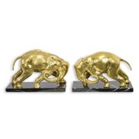 A PAIR OF BRONZE ELEPHANT BOOKENDS A PAIR OF BRONZE ELEPHANT BOOKENDS