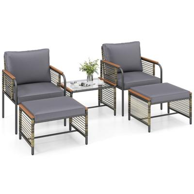 5-Delige Buitenmeubelset met Kussens PE-rotan Stoelen voor Terras met 2 Voetenbankjes en Salontafel van Gehard Glas Donkergrijs