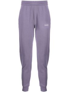 Calvin Klein pantalon de jogging à logo imprimé - Violet