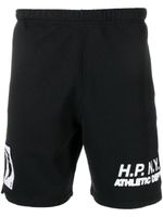 Heron Preston short de sport en coton à slogan imprimé - Noir