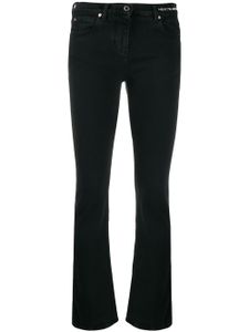 Valentino Garavani jean slim à détail de slogan - Noir