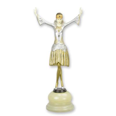 A BRONZE SCULPTURE OF A TURBAN DANCER MOUNTED ON JADE BASE