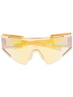 Balmain Eyewear lunettes de soleil à monture transparente - Or