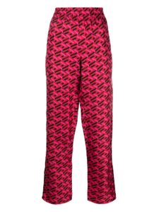 Versace bas de pyjama en soie à logo imprimé - Rouge