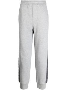 Neil Barrett pantalon de jogging à taille basse - Gris