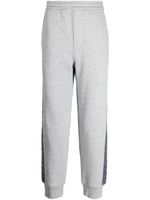 Neil Barrett pantalon de jogging à taille basse - Gris