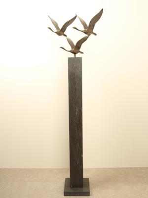 3 bronzen zwanen