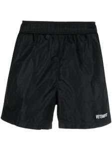 VETEMENTS short de sport à logo imprimé - Noir