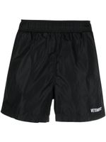 VETEMENTS short de sport à logo imprimé - Noir - thumbnail