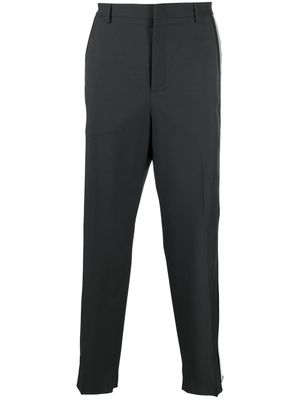 Valentino Garavani pantalon de costume ample à rayures latérales - Gris