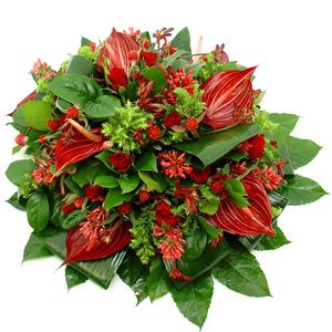Rouwarrangement rode bloemen