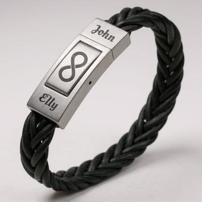 Drukschakelaar met naam gravure - gevlochten zwart leer