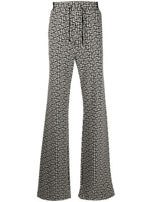 Balmain pantalon à motif monogrammé - Tons neutres Balmain pantalon à motif monogrammé - Tons neutres
