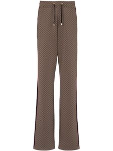 Balmain pantalon de jogging à imprimé monogrammé - Marron