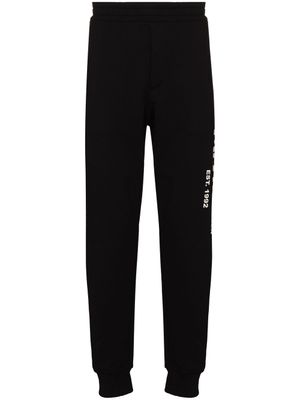 Alexander McQueen pantalon de jogging à imprimé graffiti - Noir