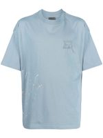 Musium Div. t-shirt en coton à effet taches de peinture - Bleu