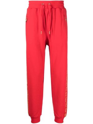 Ksubi pantalon de jogging à slogan brodé - Rouge