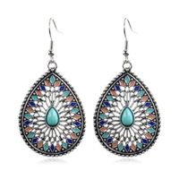 Druppelvormige Bohemian multicolor oorbellen met turquoise
