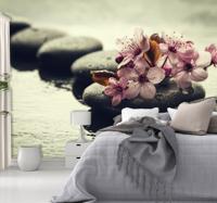 Fotobehang met stenen op mooi water
