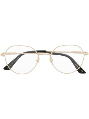 Gucci Eyewear lunettes de vue rondes à logo gravé - Or