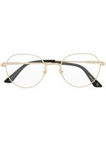Gucci Eyewear lunettes de vue rondes à logo gravé - Or