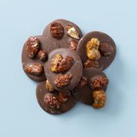 Chocolade flikken gekarameliseerde noten 200 gram