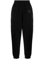 Alexander Wang pantalon de jogging fuselé à logo imprimé - Noir