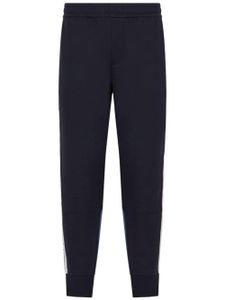 Armani Exchange pantalon de jogging fuselé à logo imprimé - Bleu