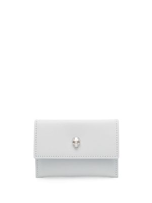 Alexander McQueen ceinture en cuir à motif tête de mort - Gris