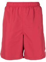 Stüssy short de bain à logo imprimé - Rouge