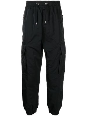Balmain pantalon fuselé à poches cargo - Noir