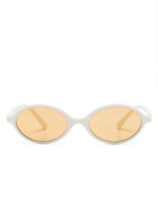 Miu Miu Eyewear lunettes de soleil ovales à plaque logo - Blanc