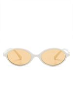 Miu Miu Eyewear lunettes de soleil ovales à plaque logo - Blanc