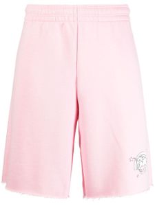 VETEMENTS short de sport à imprimé graphique - Rose