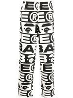 A BATHING APE® pantalon de jogging en coton biologique à logo imprimé - Noir