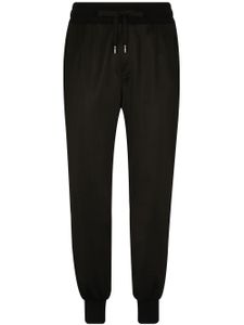 Dolce & Gabbana pantalon de jogging à patch logo - Noir