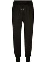 Dolce & Gabbana pantalon de jogging à patch logo - Noir