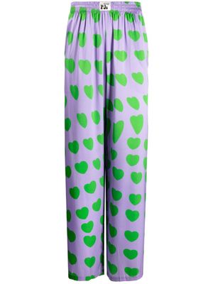 Natasha Zinko pantalon évasé à imprimé cœur - Violet